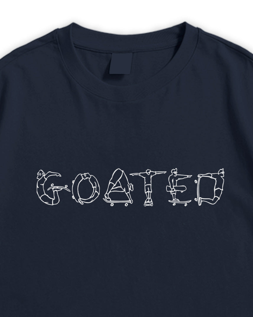 Navy blue t-shirt with white GOATED graphic design on a white background