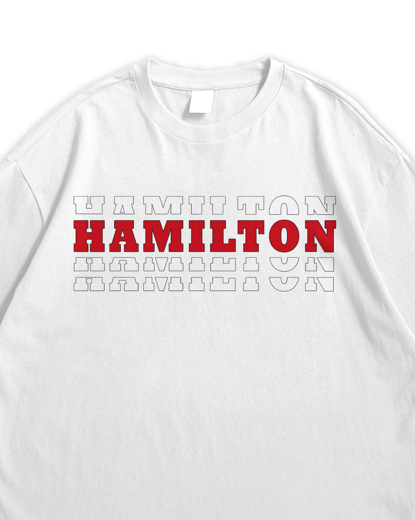 White t-shirt with 'Hamilton' text in red and black on a white background