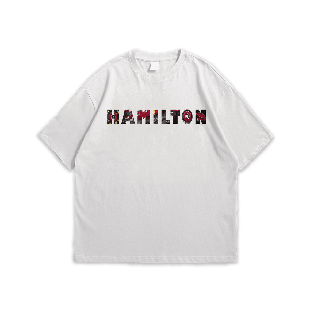 White t-shirt with 'HAMILTON' printed on it against a white background