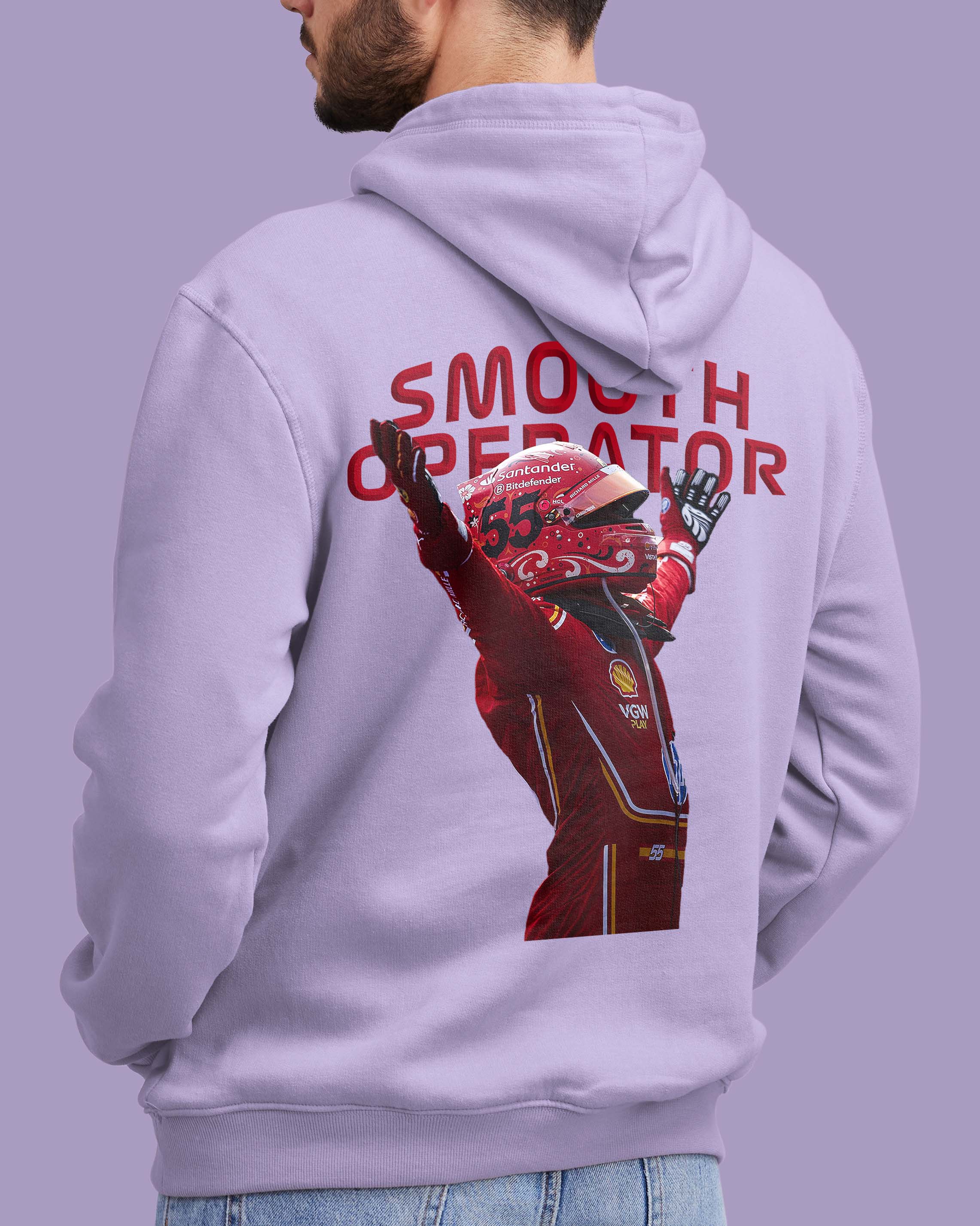 Person wearing a lavender color hoodie with a graphic of Carlos Sainz in Ferrari racing suit and helmet, and the text 'Smooth Operator' on the back.